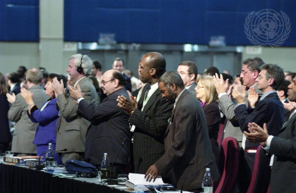 Delegates giving their applause following the speech of Thabo Mbeki, President of South Africa, at the close of the Summit.